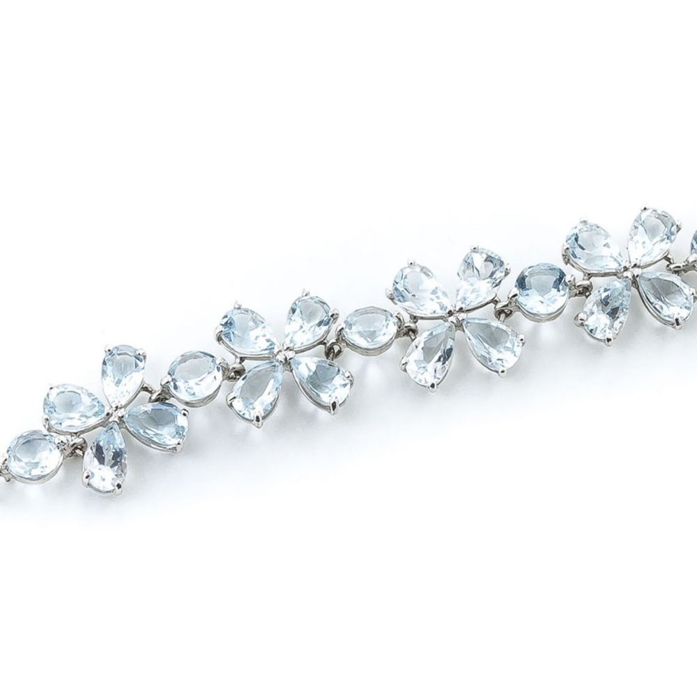 14K. SOLID GOLD BRACELET WITH NATURAL AQUAMARINES